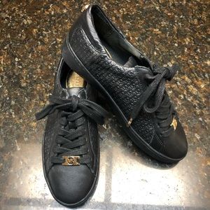 Michael Kors Black and gold tennis shoes leather